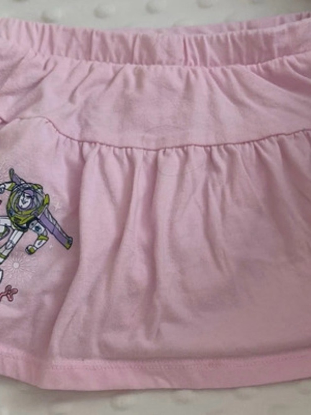 Disney Pink Ruffle Skirt with Buzz Lightyear Accent